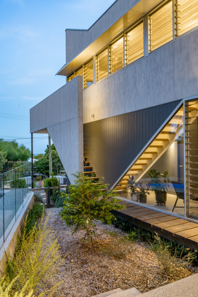 Contemporary home exterior detail showcasing craftsmanship and attention to detail in a Living Green Designer Homes project.