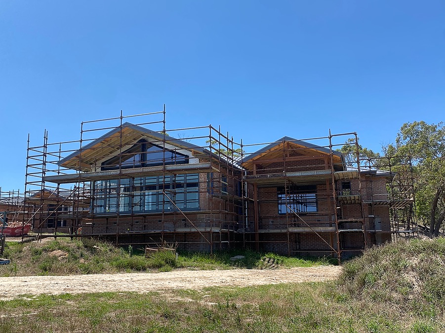 Somersby acreage home taking shape across the sloping rural site