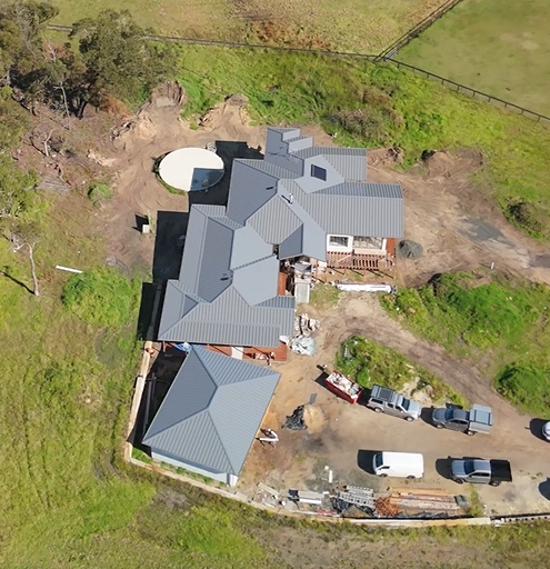 Aerial view of the single-level acreage home under construction in Somersby